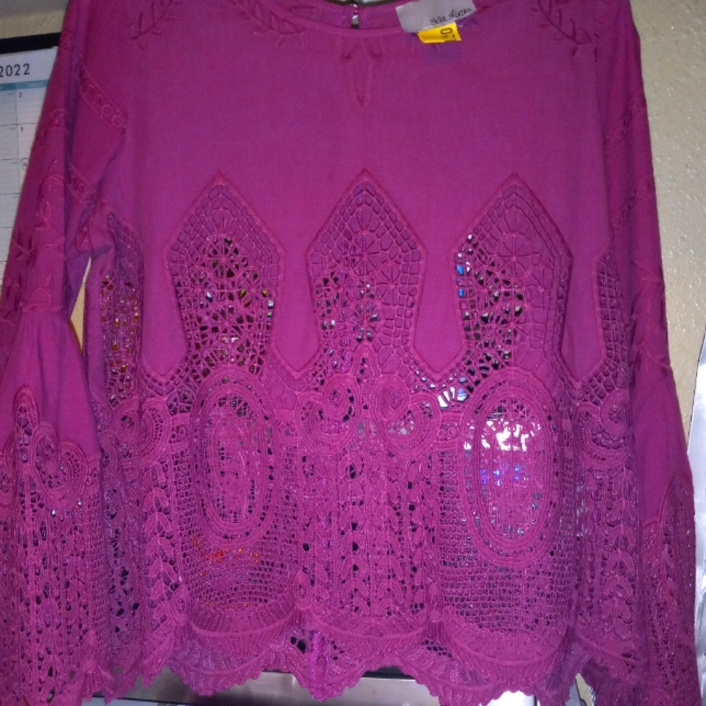 This BEAUTIFUL plum blouse has a gorgeous " Bell " flared crocheted sleeve